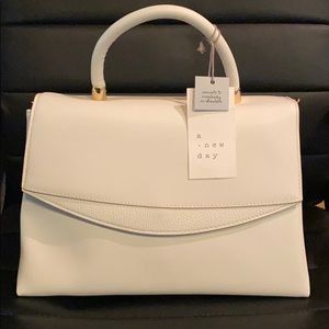 A new day Handbag